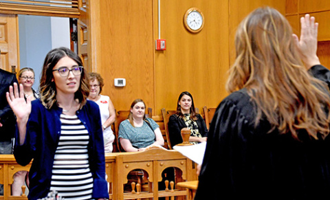 Carly Noack takes the oath as she is sworn in as Hamilton County clerk magistrate by Judge Lynelle D. Homolka Wednesday afternoon, Sept. 13.