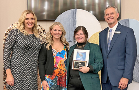 Melissa Sellers, second from right, was presented with the Marvin Spomer Novice Art Educator Award, named after Marvin Spomer, a founding member of Nebraska Art Teachers Association (NATA). Sellers is seen here at the awards ceremony held Friday in Lincoln. Pictured from left are Crystal Hassenstaab, the awards chair for NATA; Sellers’ nominator and K-6 art teacher for Kearney Public Schools, Kameran Dostal; Sellers and NATA president, Bob Reeker. 