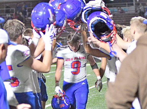 Teammates give HPC senior Wyatt Urkoski a final salute on Thursday night.