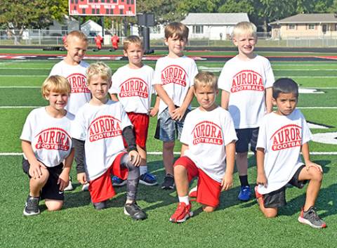 The Aurora 1st grade flag football team poses for an end-of-season photo. 