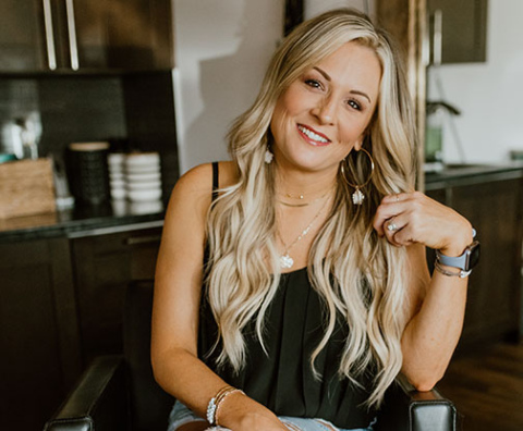Kylie Bruns poses for a promotional photo for her business, Bah-Shah Salon & Suites in Lincoln.