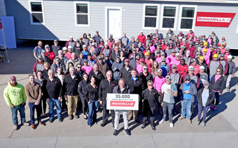 Many of BonnaVilla Homes’ 160 employees gathered Thursday with some of the company’s largest dealers, as well as corporate representatives from Chief Industries, to celebrate production of the 35,000th house at the Aurora plant.