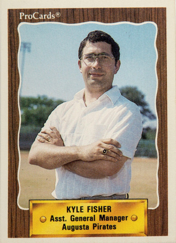 Kyle Fisher is seen here in his own baseball card which was made for him when he worked with the former Augusta Pirates minor league baseball team in Georgia during the 90s.
