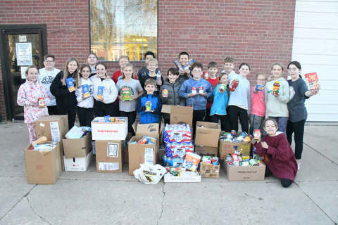 Pictured here is a group of CmPS members dropping off the donations at the pantry Friday afternoon.