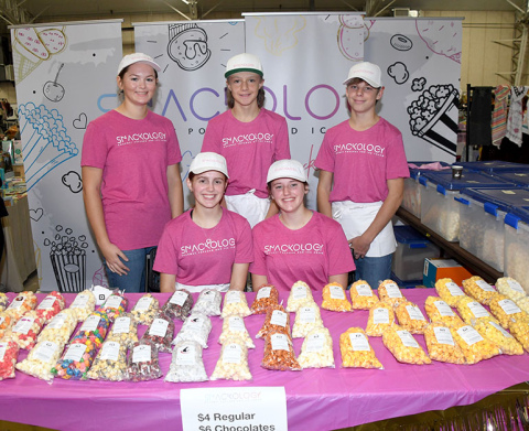 “Snackologists” at the new gourmet popcorn and ice cream business in Aurora include, front from left: Jasmine Hansen and Allison Bangs. Back from left: Kennedy Kleinschmidt, Chase Dimmitt and Isaiah Uhrmacher.