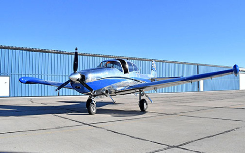 This 1947 Navion airplane that has been hangared at the Aurora Airport for the past several years while undergoing a makeover, shines like chrome but the skin is actually polished aluminum accented with blue. 