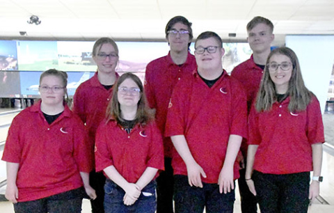 Members of the Aurora High School Unified Bowling pose for a team photo prior to their tournament in Grand Island on Saturday, Nov. 18. From left, front row Kate Glinn, Bre Telford, Quinton Lange, Maggie Brandt; back row Jessica Schleichardt, Nicholas Schleichardt and Jacob Fink. Not pictured are  Cheyenne Aspergren, Sofia Hendrickson, Alex Jimenez, Zeke Jimenez, Bradin Kenndey, Teagan Peterson and Jorja Pohlmeier.