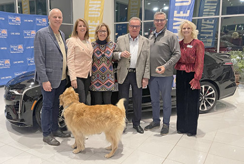Pictured from left at Thursday’s 25 Keys of Christmas car giveway are campaign chairmen Mark and Renee Miller, Kim and Tom Dinsdale, car winner Terry Pfeifer, and United Way President Karen Rathke.