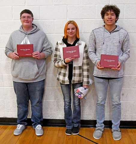 Aurora High School seniors, from left, Silis McCullick, Amber Cure and Cameron Collazo were among those graduating at a ceremony Dec. 20. 