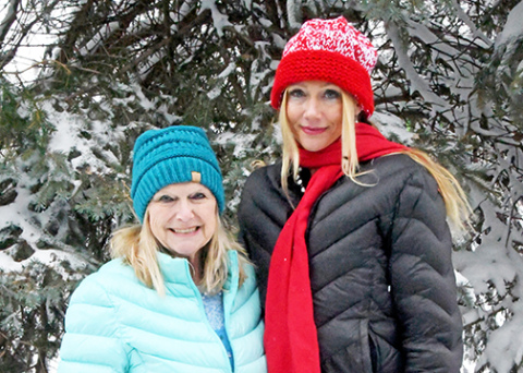 Documentary film producer Jennifer Jarosik, right, from Dubai takes time for a picture with her mother, Connie Bunker of Aurora.