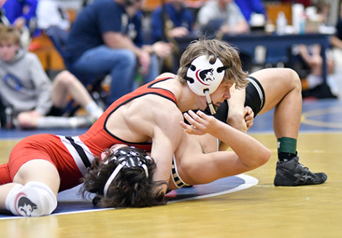 Karsten Hohm won his first Central Conference championship Saturday in York, finishing fourth and third in his first two seasons. 