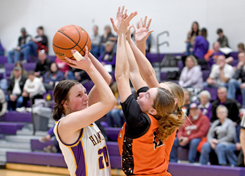 Hampton senior Nevaeh Lukassen fought through the pain of having a dislocated finger in Friday’s home finale, scoring 15 points in the Lady Hawks win over Giltner.