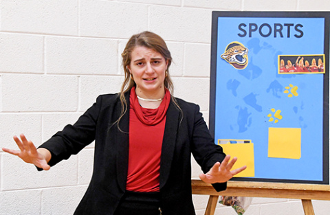 Aurora performer, Kim Evans, shares the joys of being a fan within the world of sports in varsity entertainment. Evans placed 13th during the Saturday meet.