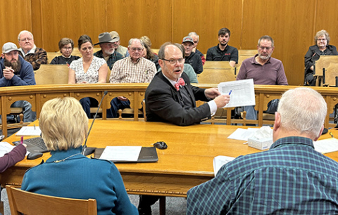 Doug Frank, center, shares information with county board members Rich Nelson, right, and Nancy Salmon during Monday’s presentation at the Hamilton County Courthouse. More than 25 people attended the meeting, showing shared concern with the integrity of local elections.
