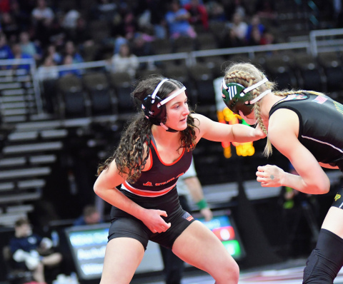 Natalie Bisbee went 1-1 Friday, finishing her senior season with a 32-14 record.