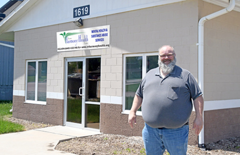 Aurora Harmony Health Center owner Brad Shay stands outside the new building Harmony Health will be moving into, located at 1619 9th St., where Nebraska Kinesiology Center was previously located.