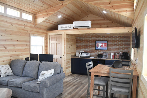 Co-owners Brian and Grant Litz have rebranded a portable building business to NE Sheds with their new partnership with Mid-America Structures. Shown here is the interior of one of the units, which serves as their office space.
