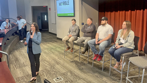 Jordyn Bader discusses her work with the ag-tech startup Marble Technologies during the Heuermann Lecture on May 29. She was part of a panel of ag-tech entrepreneurs that also included (from left) Shane Forney of Sentinel Fertigation; Chad Johnson of Grain Weevil; Jacob Hansen of ALA Engineering; and Jessica Korinek of Nave Analytics. (Cara Pesek/IANR Media)