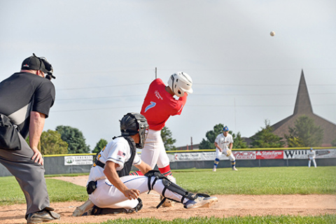 Devin Otto smashes a pitch towards the outfield during a game earlier this season. 