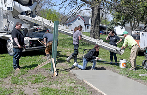 A new concrete tee pad is poured for the Refshauge Park Disc Golf course in Aurora