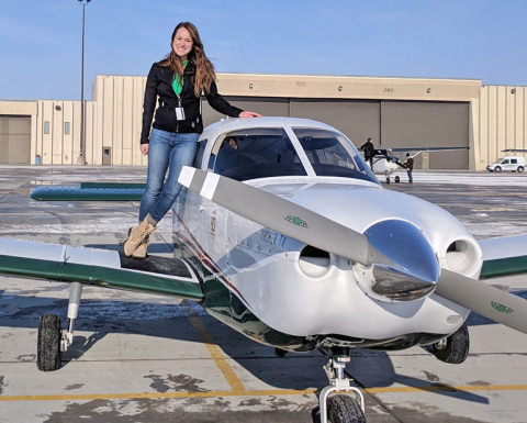 Bethany (Janzen) McFadden has been flying out as a commerical pilot in Kearney since 2021. McFadden poses next to a plane after she completed her first solo flight in 2017.