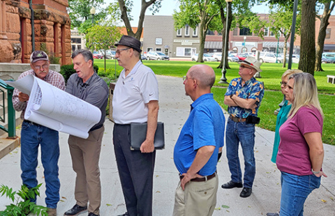 The Hamilton County Commission took its meeting outdoors for a time Monday morning so that board members could see first-hand what was being proposed in the first phase of a courthouse renovation and preservation project. From left are Commissioner Francis McDonald, civil engineer Chris Lane, preservation architect Jerry Berggren, Commissioner John Thomas, County Attorney Douglas Dexter and Commissioners Nancy Salmon and Nicole SaBell. 