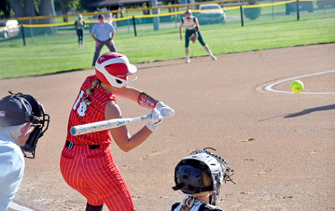 Londyn Teahon tees off during her first at-bat against Central City Thursday, a 5-3 win for the Huskies. Just two days earlier, Teahon hit a three-run walk-off homer against Grand Island Northwest, highlighting the team’s first win over the Vikings since 2010. 