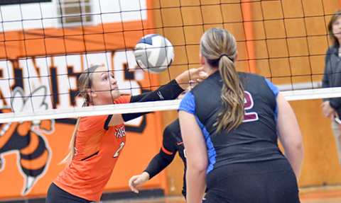 Gracie Kreutz keeps the ball alive during Giltner’s two-set win over Newman Grove/St. Edward. 