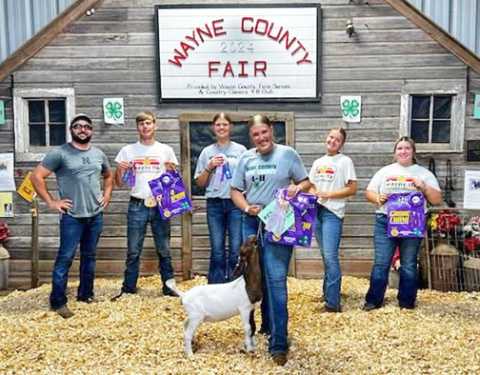 Trevor Sullivan, left, stands with the five Wayne County FFA members who used his goats to participate in showmanship at the county fair. One of the students went on to show at the state fair last week.  