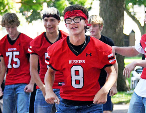 Lukas Fry (front) gets into the music during the senior athletes’ dance alongside fellow classmates from left Landon Siebke, Jace Dorsey and Dane Bellis. 