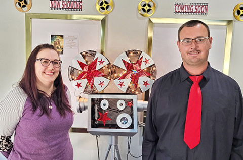 Two of the 12th Street Cinema’s three paid staff members are shown here in the theater lobby. Brooke Johnson and Jonathan Dyer are responsible for selling tickets, opening and closing the theater each weekend, managing concessions and clean up. Not pictured is the theater’s manager Sheryl Hall. 