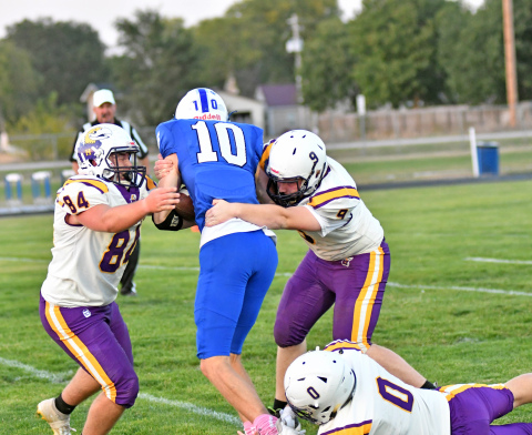 Hampton's defense swarms to the football during a 45-34 win at Shelton Thursday. 