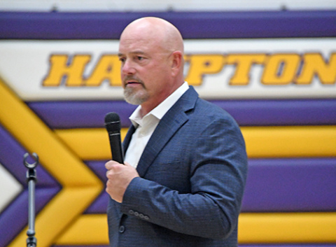 Marine Maj. Brian Bresnahan delivers remarks at the Hampton School Veterans Day program on Monday. 