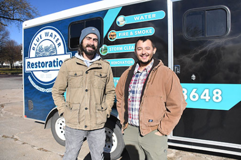 Maverick Huebert, left, and JT Wetherington launched Blue Water Restoration in August of 2023 and are excited to now be moving their business into a permanent home at 1016 M St. in Aurora.