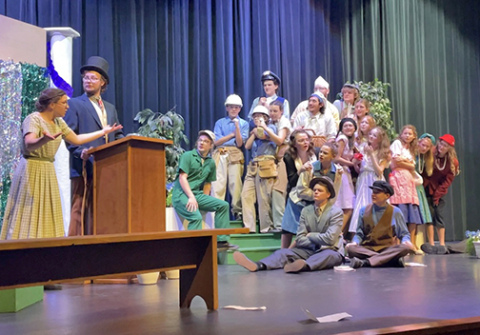 The Aurora One-Act team held a dress rehearsal for its comedy production of “MAYOR” last Tuesday night. Leading the scene is Jorja Pohlmeier (left) as Dorene, the mayor’s wife.