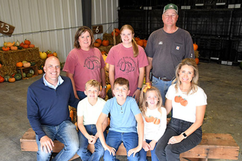 Pictured in the front row are the new owners of Kountry Kids Pumpkins, including Eric, Evan, Will, Allie and Megan Dam. Back from left are former owners Barb, Morgan and Greg Bonifas. Not pictured are Grant and Blaine Bonifas.