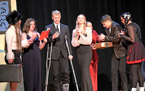 Pictured from left are Jillian Farris as Svetlana, Alana Wiarda as Amanda, Aydenn Scherff as Eddie Seabreeze, Kiersten Joseph as Elise, Macy Miller as Charmaine, Brayden Wolinski as Rondo and Gavin Gilmore as Mo.