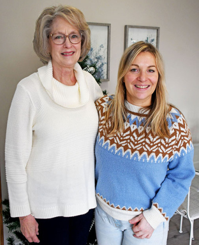 Belgian Marie Brasseur, right, a foreign exchange student to Aurora in 1997-98, stands next to Deanna Powell who was one of her four host mothers during her year in the U.S. 