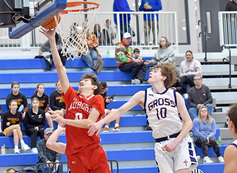 Jaxon Slagle scored and recorded a blocked shot almost immediately upon entering the game in the second half for Aurora, a 59-37 win over Omaha Gross Friday. 