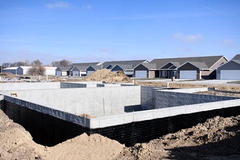 Construction has begun on two new duplexes on Cottage Park Drive, which mirror the Mesner Development project shown in the background.