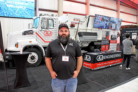 Kyle Moss, director of integration and testing for Lincoln-based ALA Engineering, stands in front of the company’s prototype autonomous cattle feeding truck on display at the Nebraska Ag Expo in early December. Moss works out of the Scottsbluff location of the company where he oversees product integration and testing. 