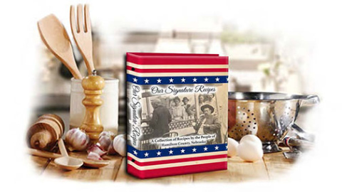 “Our Signature Recipes” is set to be available prior to Thanksgiving. Featured is the prototype cover of the cookbook featuring a photo of a soup stand at the Hamilton County Fair in Orville City in 1873.