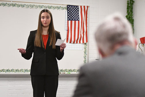ayke Krueger of Aurora delivers an Extemporaneous speech during Saturday’s Aurora Invite.