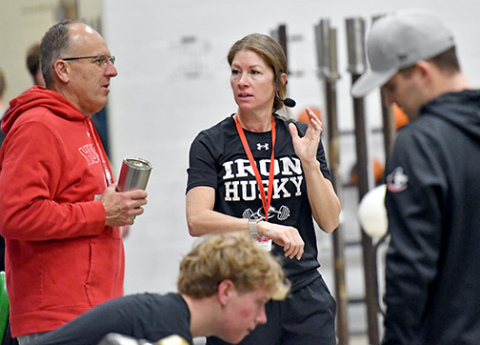 Sara Sutherland (center) is Aurora’s new strength and conditioning coach and has taken over the block zero weights class as well as the summer lifting program. 