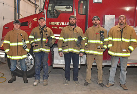 A few of the 18 members of the Hordville Volunteer Fire Department.