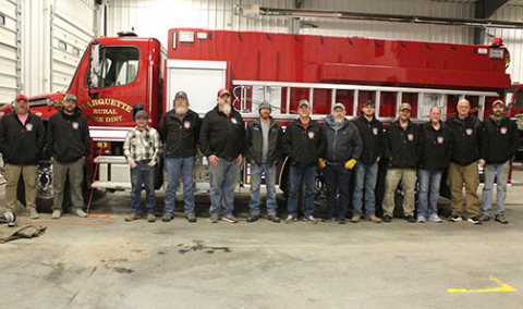 Some of the 20 members of the Marquette Fire & Rescue squad.