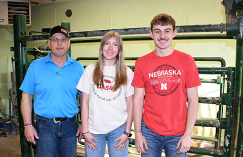 Emma Ellis-Sack, center, and Kash Majerus, right, have both been named recipients of the Nebraska Elite 11 Veterinarian Program scholarship. Pictured at left is Dan Pachta, owner of the Aurora Veterinary Clinic.