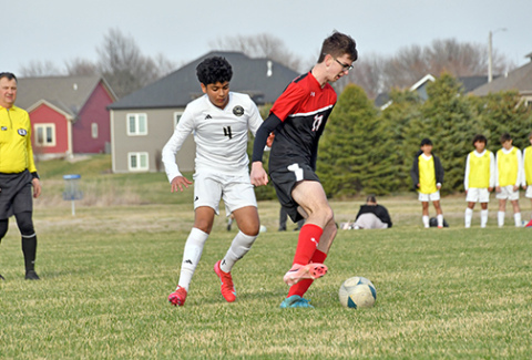 Aurora senior Thomas Brandl, shown here defending against a Northwest player April 1, scored twice for the Huskies in a 5-1 win at Lakeview Thursday. 