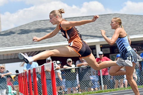 Jordan Margritz sails over one of the final hurdles during the 100 hurdle final in last week’s D-6 district meet at Sandy Creek. Margritz won the event with a new area-best time of 15.77. 