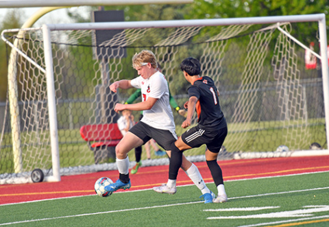 Aurora’s Garrett Kuehner (7) scored the team’s lone goal in Monday’s B-7 subdistrict loss to Hastings, ending the Huskies’ season. 